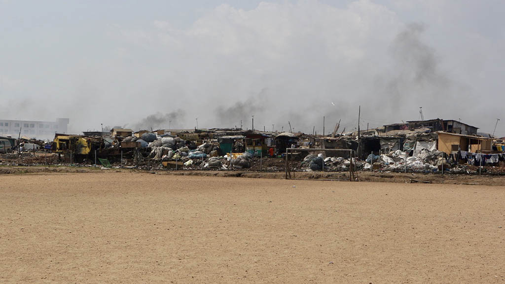 Football pitch by the scrapyard